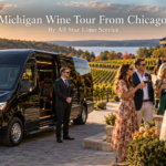 Michigan wine tour from Chicago with a black Mercedes Sprinter limo parked at a vineyard as a group of friends toasts with wine in autumn